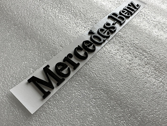 Надпись Mercedes - Benz , чёрная