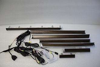 Накладки Land Cruiser 200 в салон, под дерево, с подсветкой LED (двери + панель)
