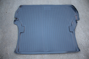 Тюнинг для Коврик в багажник Land Cruiser 100 / LX 470 серый ,  Novline (полиуретан) 