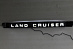 Планка Land Cruiser 200 2008-2015 над задним номером с надписью Land Cruiser , чёрная , с подсветкой